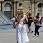 1 mobile phone + 2 ladies taking a selfie