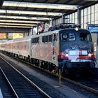 115 509 "80 Jahre Auto im Zug" München HBF