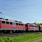 140 772-5 RBH 161 und 140 797-2 RBH 164 vor einem Ganzzug