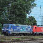 152 134-3 TFG Transfracht und 185 304-3 Railion vor einem germ. Güterzug