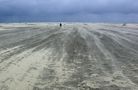 Borkum  -  Der Sturm fegt den Sand ... by Reinhold Müller