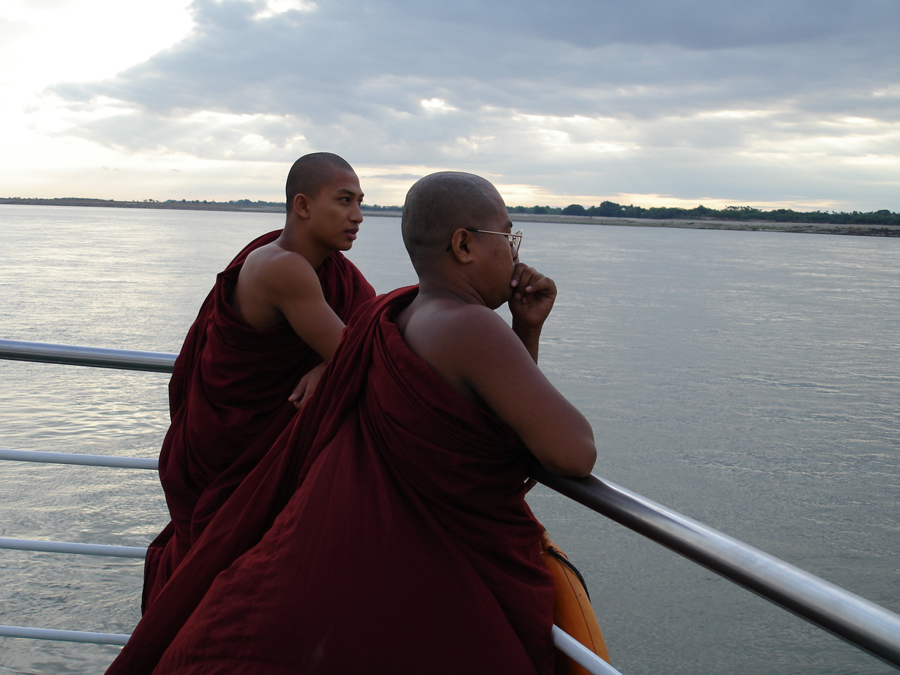 2 monks in the boat at Ayeyarwady River