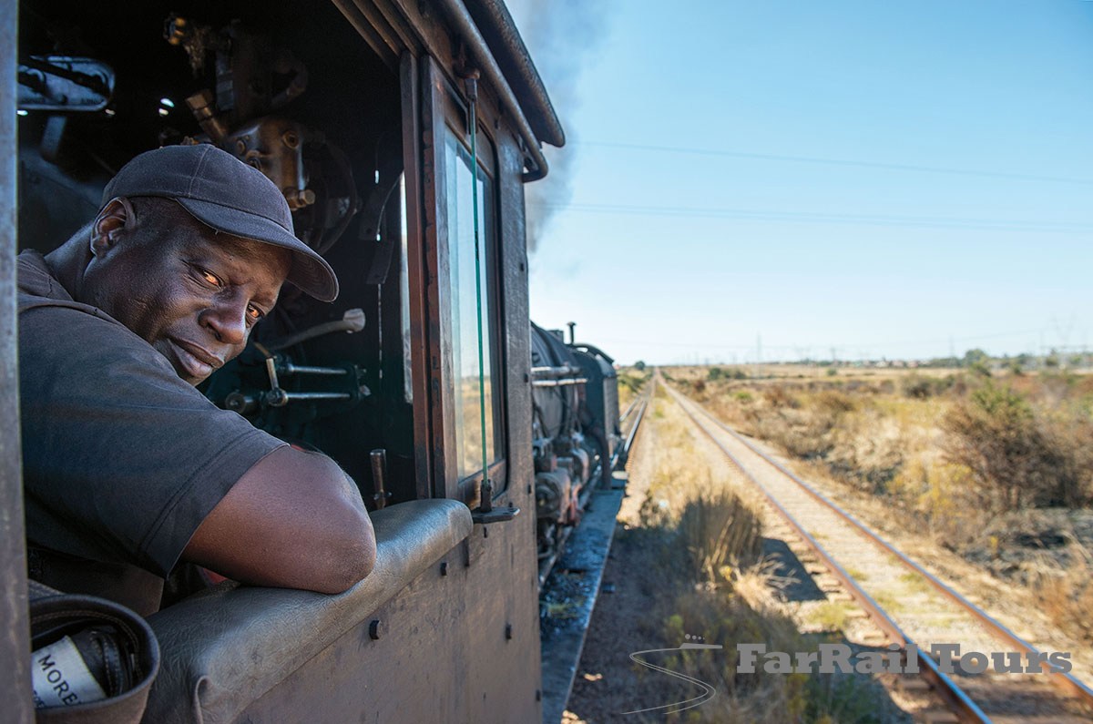 2018-06-15-Zimbabwe-vor-Cement-loco-driver-main-line-open-ZW8_6265