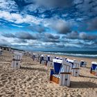 2023 Sylt - Strandkörbe unter Wolkenhimmel