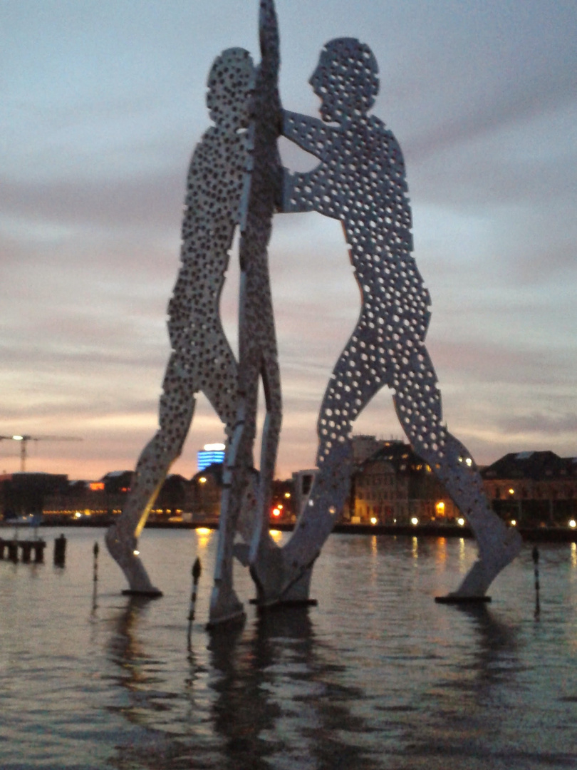 3 men walking on water