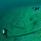 3 Taucher im Bergsee