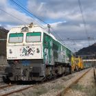 319.243 Adif con Bateadora, Perfiladora y tren de carril en Mieres