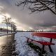 Red Bench on Snow