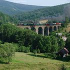 423.0145 mit Fotowolke auf dem Viadukt in Novina