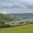 52 8134-0 mit Sonderzug und aufziehendem Gewitter bei Haiger-Rodenbach