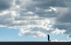 Girl walking on Sand Dune by David Arduini