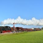 64 415 mit einem Güterzug bei Beekbergen