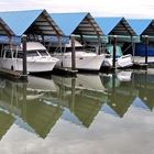 7 bateaux dans 7 hangars à bateaux