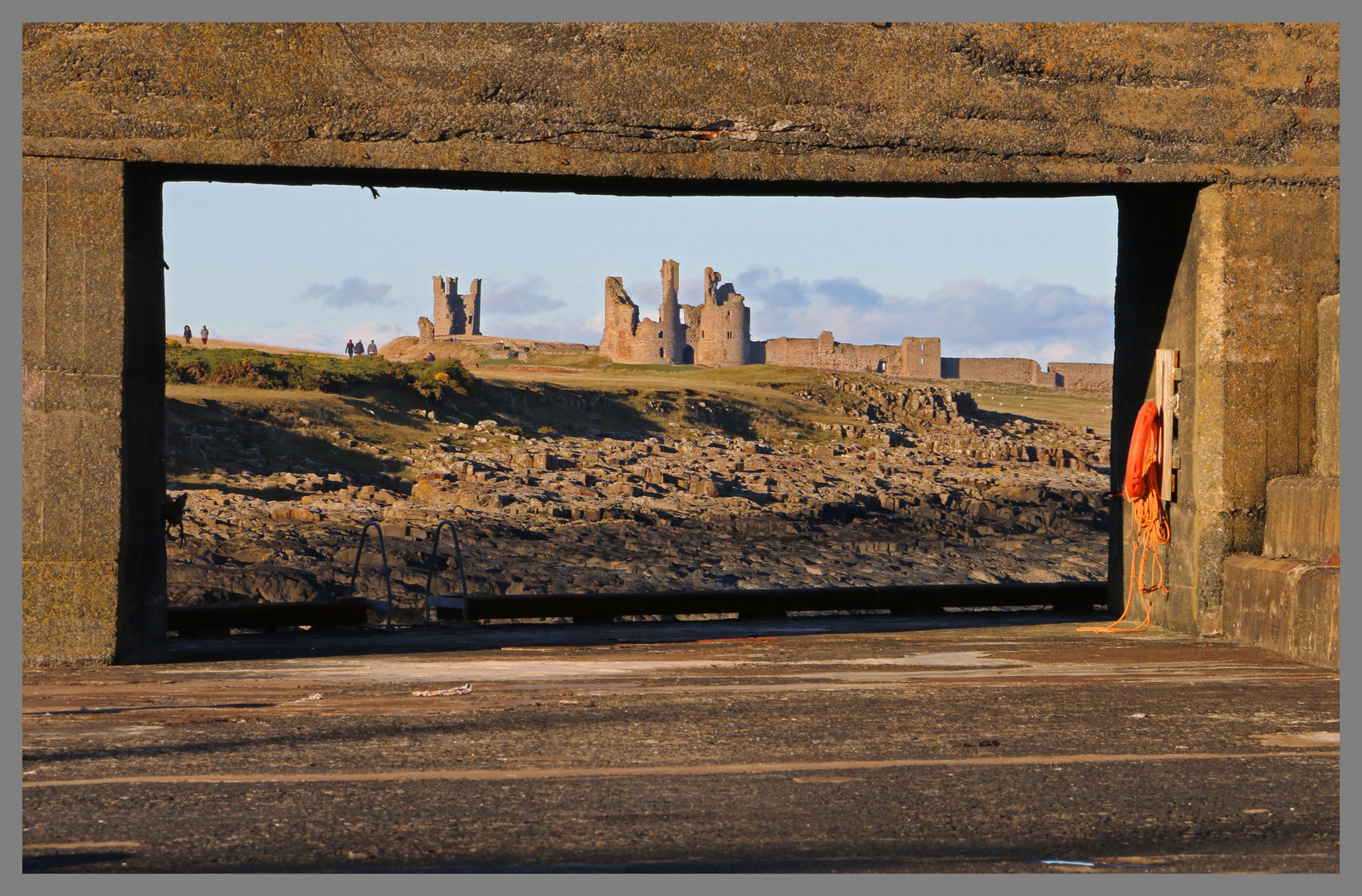 7 Dunstanburgh castle from Craster Harbour