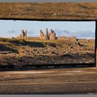 7 Dunstanburgh castle from Craster Harbour