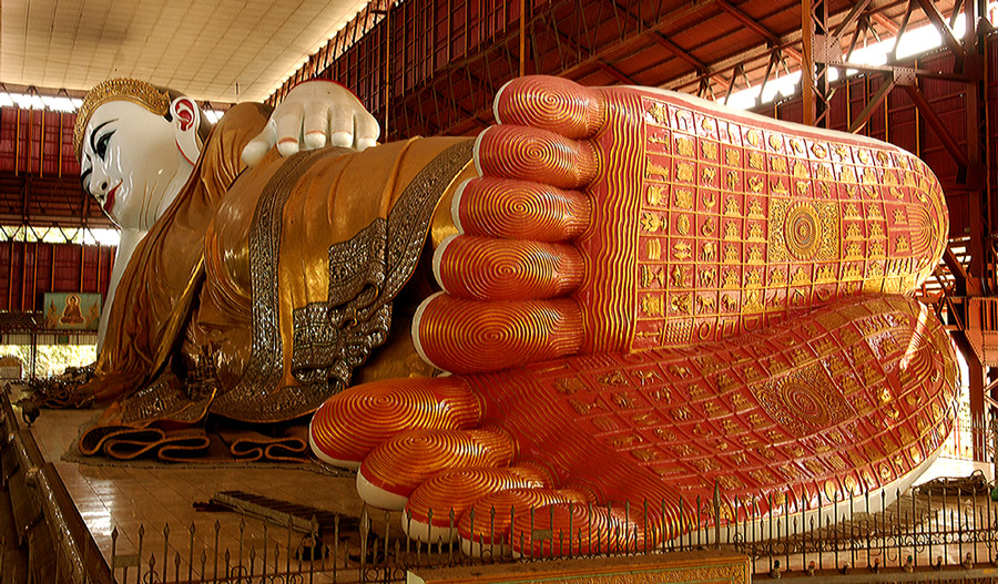 70 metre long reclining Buddha in Yangon Myanmar. Story within.