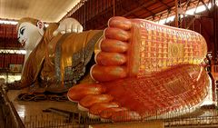 70 metre long reclining Buddha in Yangon Myanmar. Story within.