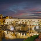 7179M-85M Ponte Vecchio Florenz beleuchtet Abendrot Panorama