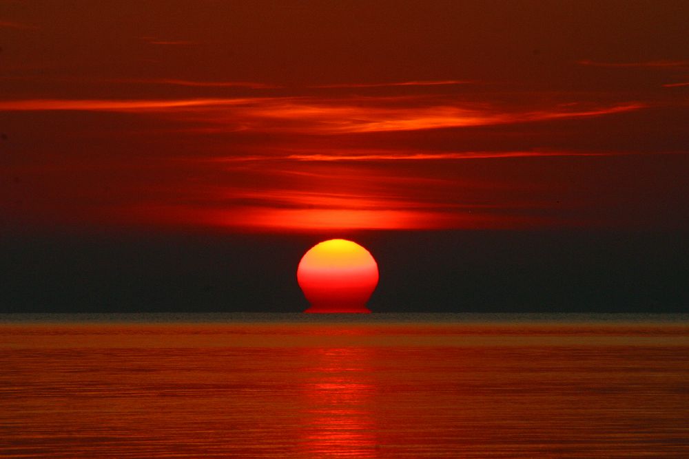 Sonne im Meer von Siegi Offermann