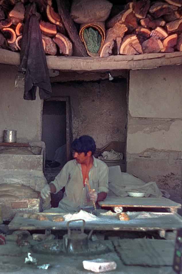 A baker making Naan bread