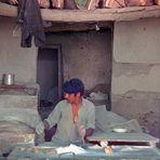 A baker making Naan bread