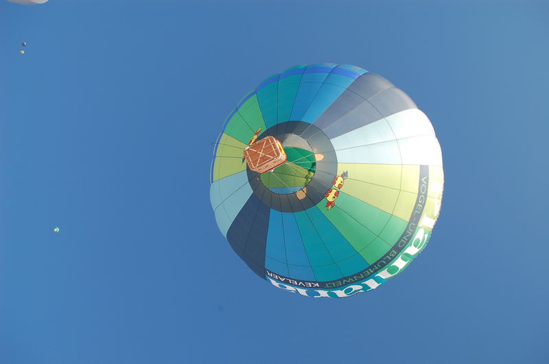 a baloon in the blue sky