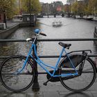 a blue bike in amsterdam