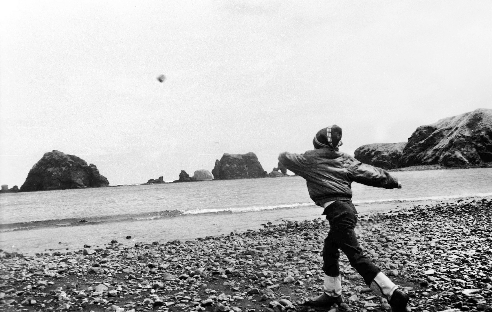 A boy and the Pacific Ocean.