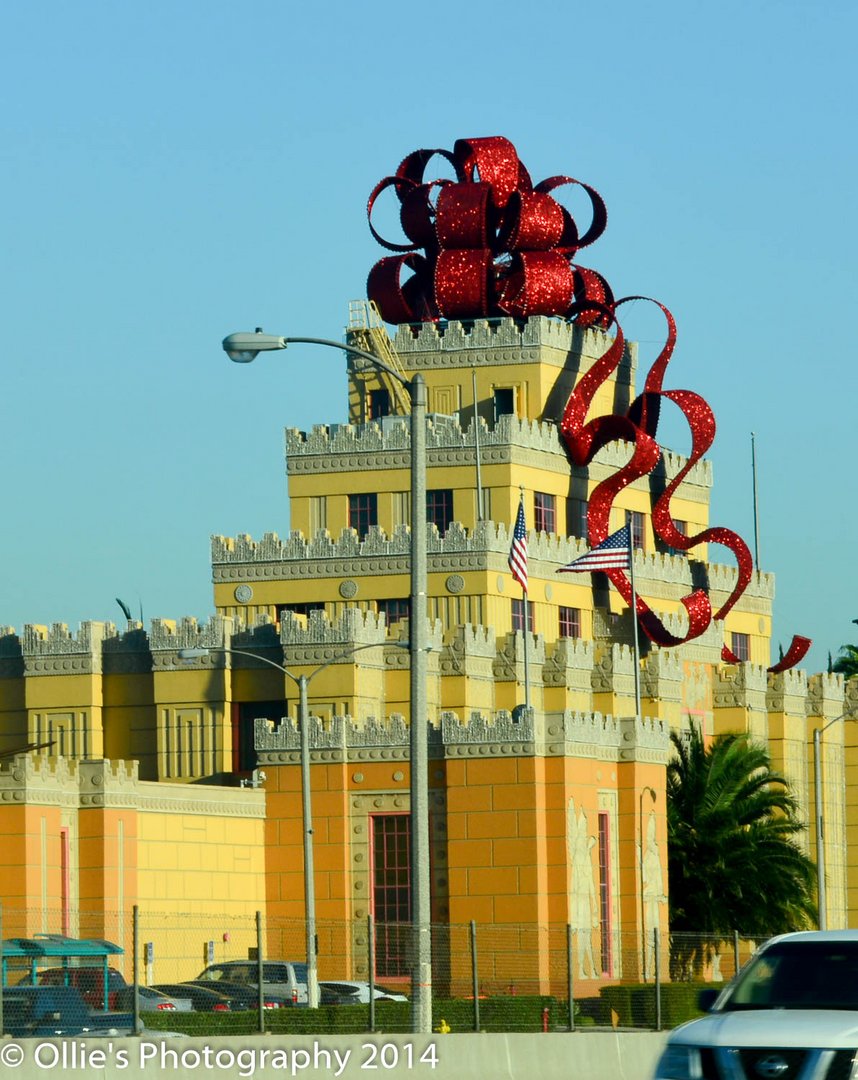 A building with a Christmas bow