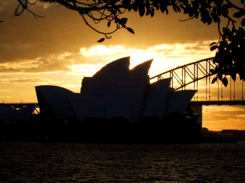 A burning sun sets over Sydney Opera House