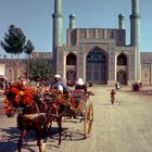 A colored hackney in front of the Friday Mosque