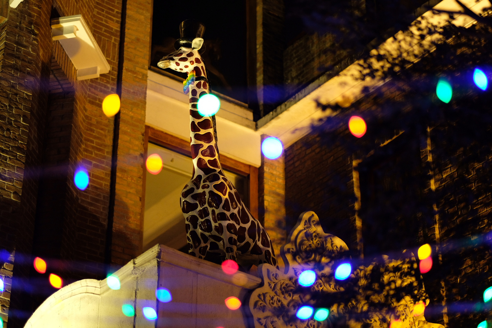 A fake giraffe on balcony @GUANGZHOU