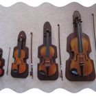 A FAMILY OF 4 VIOLINS