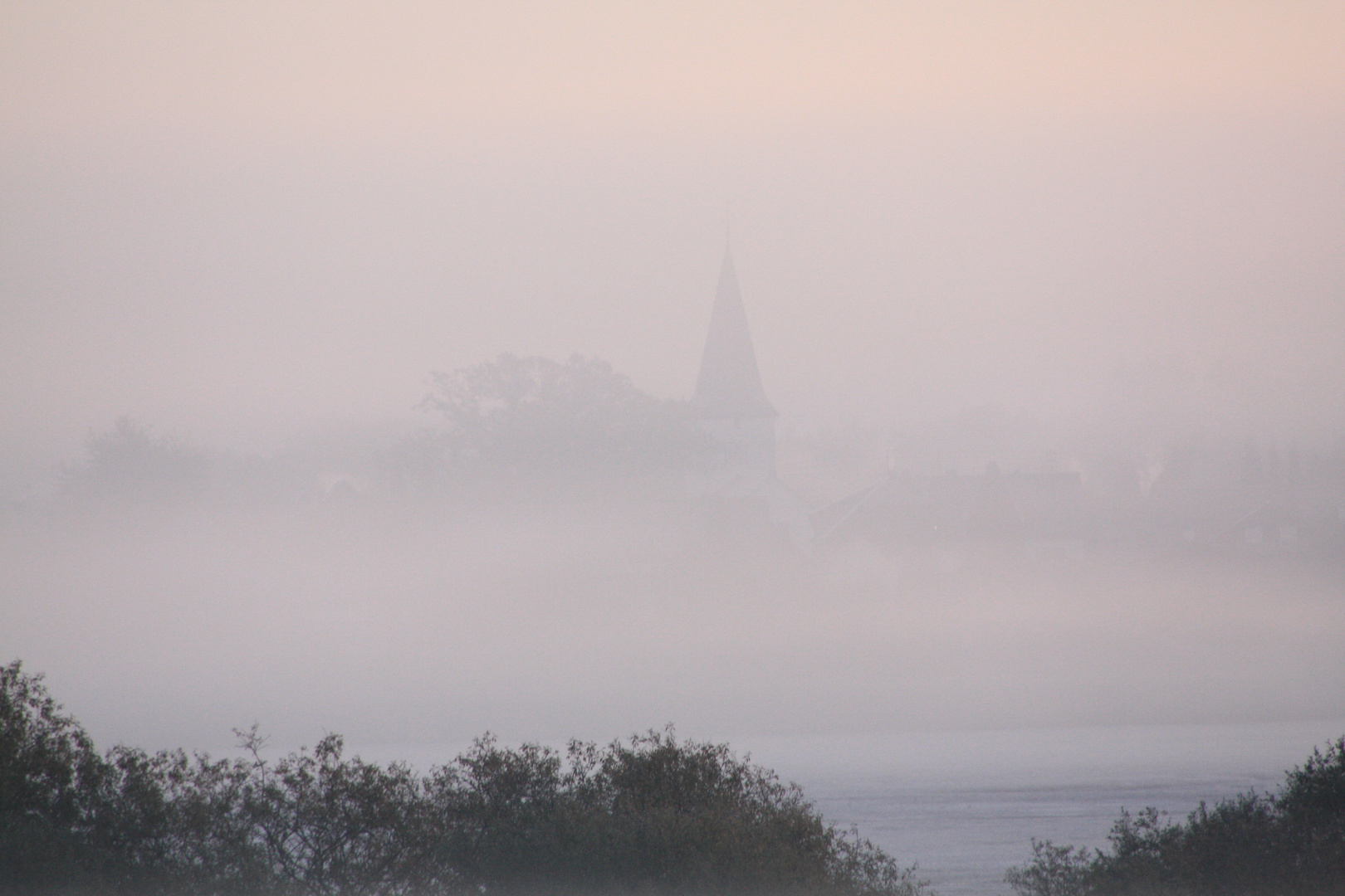 a foggy sunrise