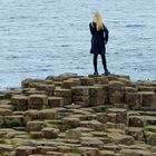 a girl at Giant's Causeway. Northern Ireland