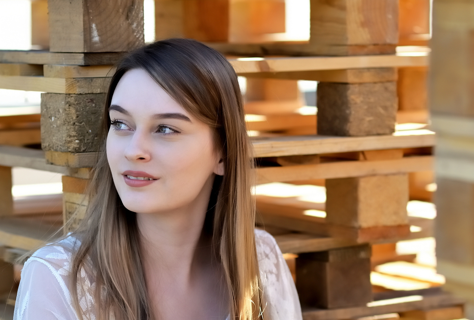 A girl between pallets