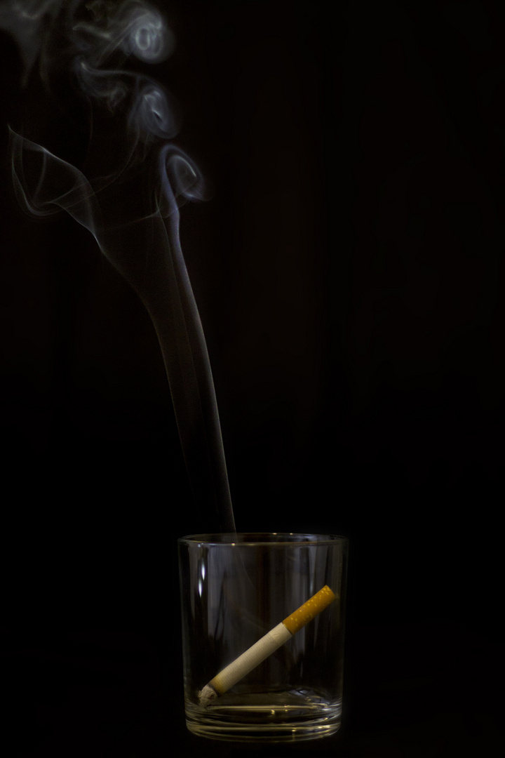 A glass of smoke - at night