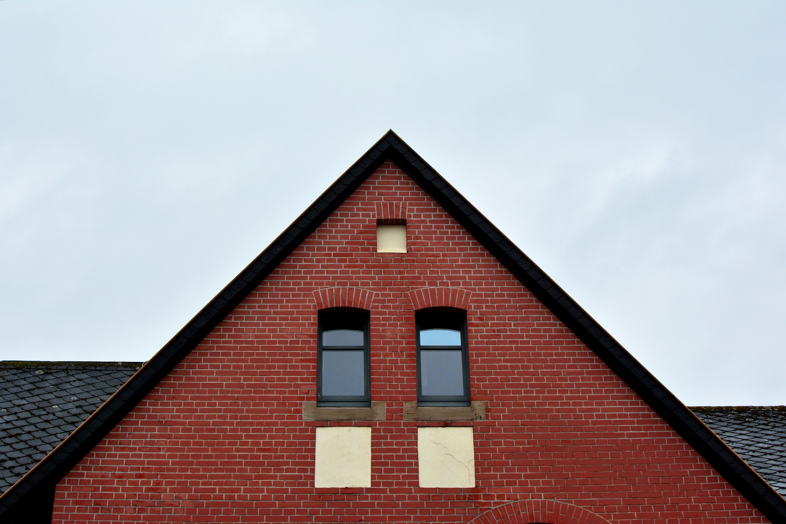 a house in the middle of a street