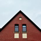 a house in the middle of a street