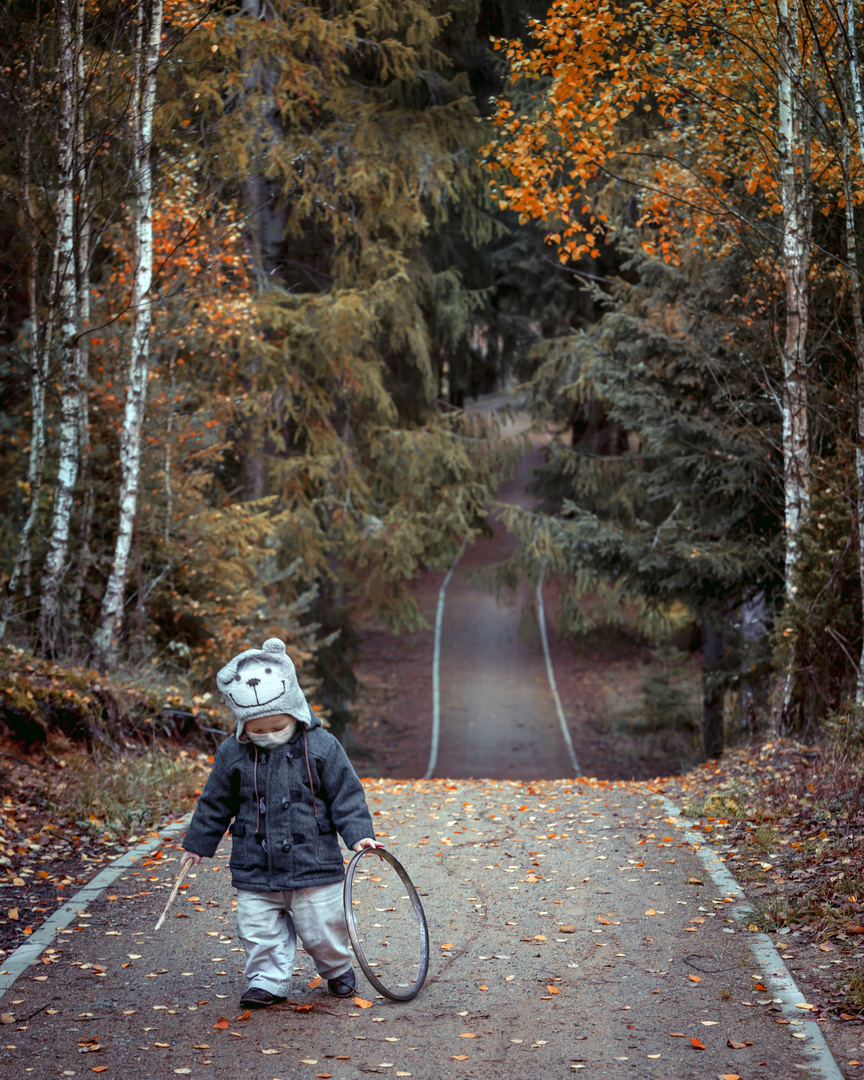 A joyful and carefree walk in the forest in a teddy bear hat