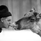 A keeper with a deer. From the nature-reserve.