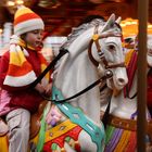 a lady on the merry-go-round.