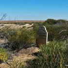 * A lone Headstone in the middle of nowhere *