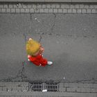 A lone walker in the carnival parade!