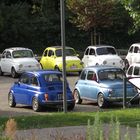 a parade of old Fiat 500