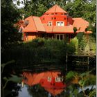 A red house over yonder