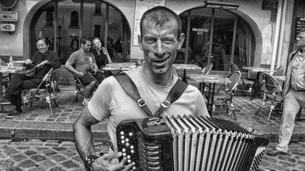 A Rissian Accordion Player in Paris