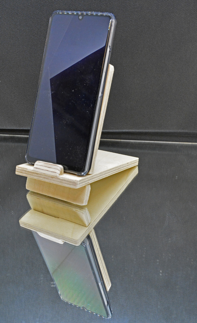 A simply self made mobile phone standing