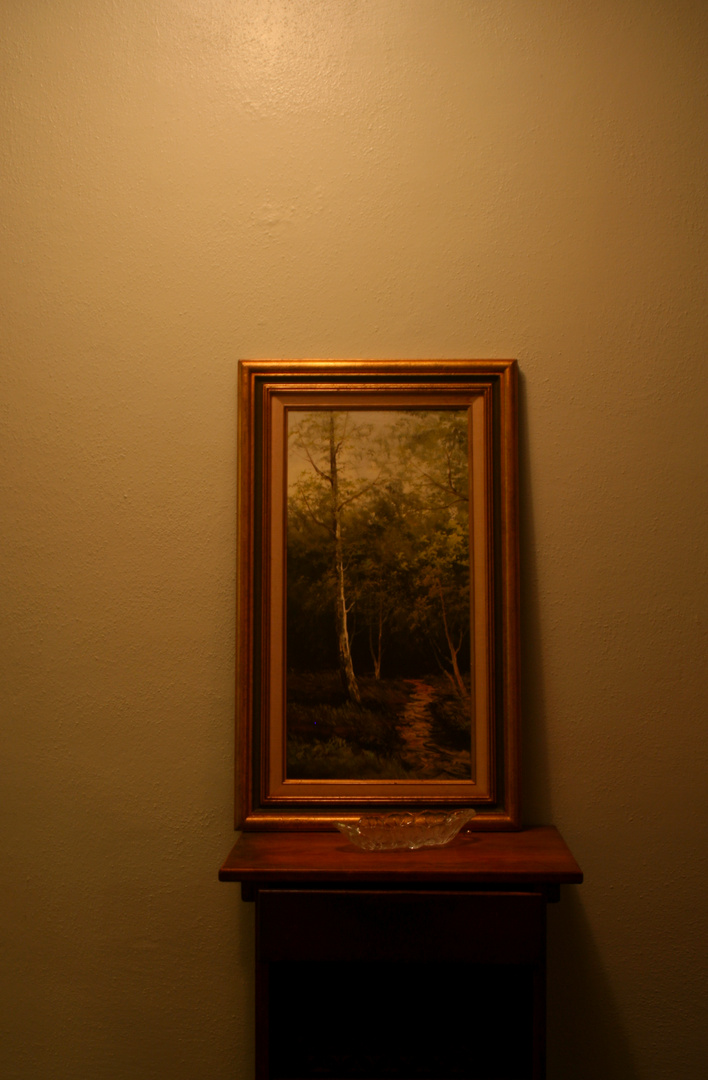 A tree sits in the painting