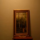 A tree sits in the painting